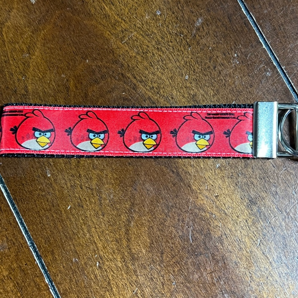 Handcrafted keychain with Angry Birds, new without tags.